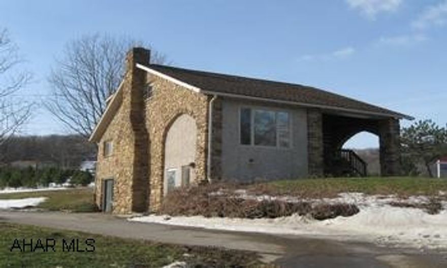 CHRISTMAS TREES NOT INCLUDED IN SALE. ONLY HOUSE AND GARAGE ON 112' X 182' LOT. PRIVATE SETTING. 3BD 3.5BA 2 STORY STONE HOME ON .47 ACRE. EUROTHANE FLOORS FLOORS AND PLASTER WALLS THROUGHOUT. LARGE 2 CAR DETACH 26'X36' CONCRETE GARAGE. CEMENT DRIVEWAY. OFFICE IN BASEMENT. NEEDS TLC. HOLLIDAYSBURG SD. CALL DAN FOR MORE DETAILS 814-932-1655