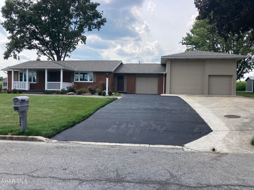 This one  of a kind remolded and updated from top to bottom brick  rancher is located in beautiful the  Martinsburg  borough,. It is sure to check all of your boxes!! 
The home features a 38' RV bay to protect your camper all season!! There is over 3000  square feet of living space,  new HVAC/AC in each room to control your room temps.
The first floor has 3 bedrooms, 1 full bath with marble counter tops and double sinks, beautiful walk-in shower. Laundry on the first floor with a powder room.
The kitchen is amazing, all the windows have views of the mountains in the cove. 
Many cabinets with plenty of storage and granite counter tops with a wide-open floor plan great for entertaining.
The totally finished basement has new drop ceilings. a full bath.  In the spacious family room there is a wood burning stove with an antique mantle and brick surround. 2 10 x 15 rooms with closets for family of guests,.
The outside is perfectly landscaped , with so much room for a growing family or that couple looking for 1 floor living.
Call today to schedule a tour of this gorgeous home!!