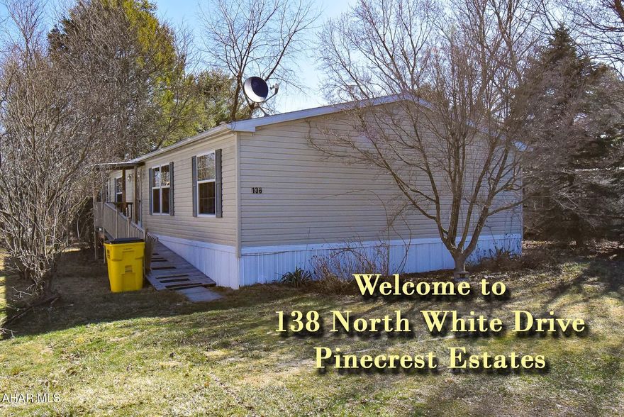 Well-maintained 3 bedroom/2 bath mobile home in Pinecrest Estates is already to go. Ramp access to front door. Still has a vehicle title, so it could be moved.