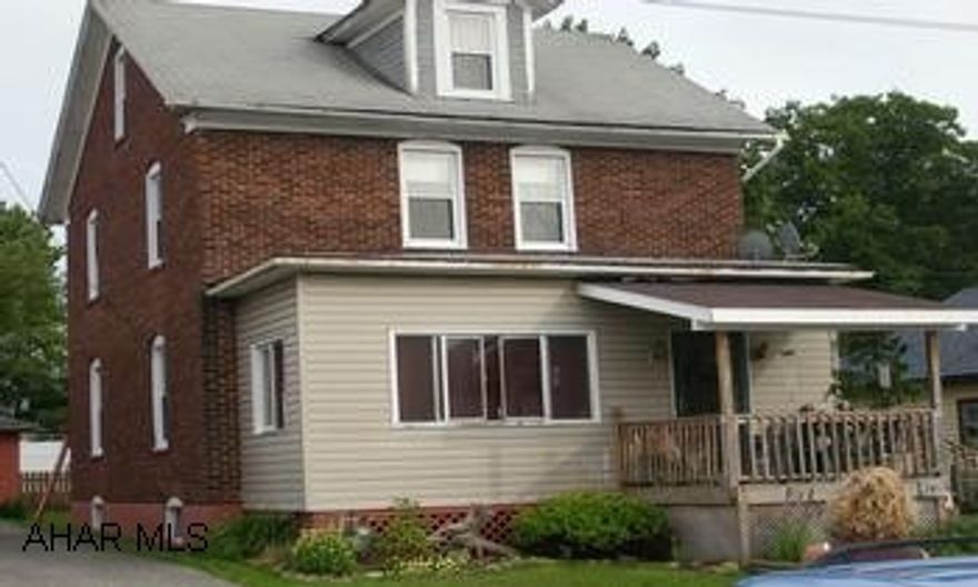 2 Story brick and vinyl - 1 car garage - Great location - Walking distance from town and school.