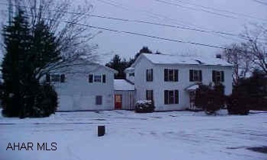 Two story home with addition that can be used as apts. Addition - 1560 sq. ft. 1unit 4 bed. 1 unit 4 bed. Property can be used as single family home or can be set up as apts. Lot size for home is .339 acre + 1.75 aces additional.