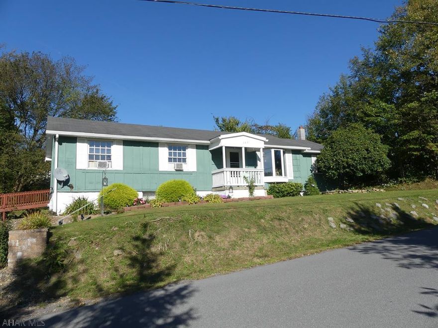 Single-level 3 bedroom, 2 bath home with attached garage on nice lot in the Cambria Heights School District. Possible 4th bedroom in finished basement. Multiple heat sources including electric, wood and pellet stove.