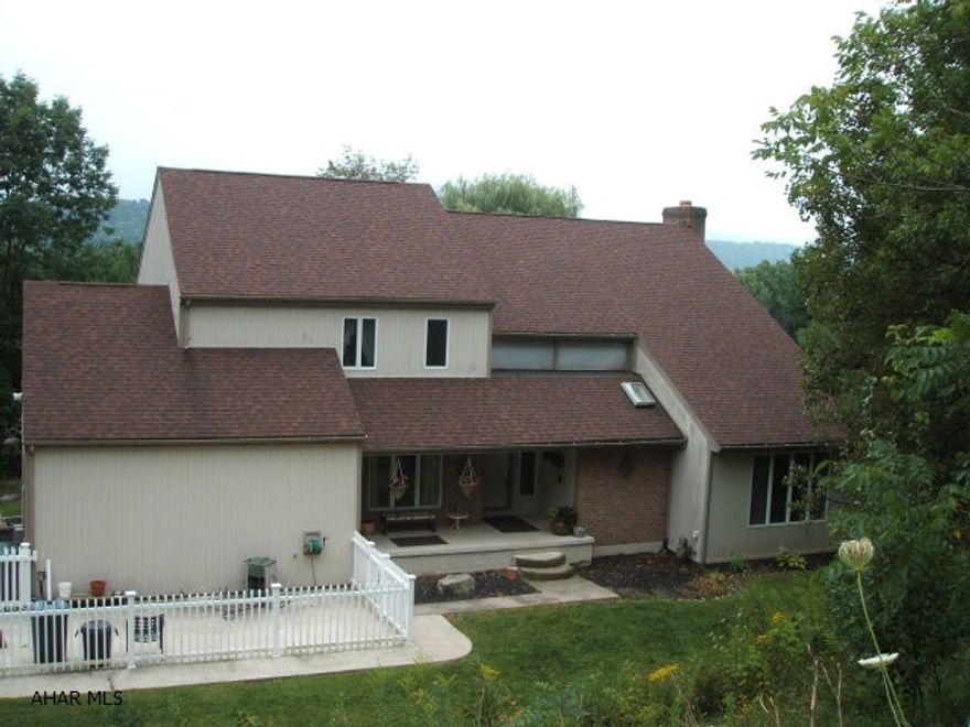 Beautiful Contemporary in Elmwood. Large Master Suite with 2 Walk in Closets, Jacquzzi Tub and Sitting Room. Large sunken Living Room with Vaulted Ceiling. Family Room is warm and open with a Fireplace and doors to the private deck. Kitchen is open with huge Center Island, Pantry and an additional entrance to the large rear Deck. First Floor Laundry, Formal Dining Room and 2 Half Baths. The deck is perfect for entertaining or just relaxing...Sun Setter retractable Awning. Electric Dog Fence. Freshly painted, New flooring. Finished basement with a 5th bedroom, Family Room and tons of storage. Too much to mention!!