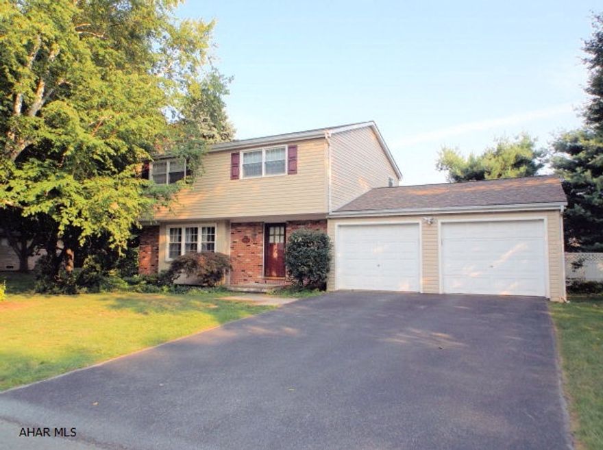 Beautifully remodeled two story with designer wall colors to please everyone.  Cherry kitchen with granite counter tops and ceramic tile floor.  Hardwood floors throughout. Formal dining room. Large living room with wood burning fireplace.  1st floor 1/2 bath. All bedrooms are spacious and will accommodate large furniture.  Finished basement with ceramic tile floor, wet bar, and new 3/4 bath. Extend Summer into Fall with the heated in ground pool. Covered patio, large yard with privacy fencing. This is a great home for entertaining both inside and outside.  Two car attached garage.  All this at an affordable price.  Act quickly!!