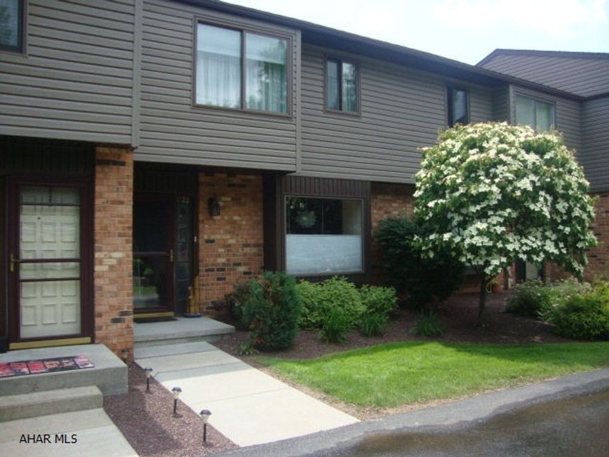 Enjoy the view and watch the wildlife from the private covered deck with an open extension of this 3 bedroom, 2 1/2 bath Hollidaysburg townhouse overlooking part of the Sylvan Hills golf course.  This quiet move-in ready home has been recently painted and features a large master with an on-suite bathroom, wood burning fireplace, and almost new central A/C unit and furnace.  The 18-unit complex has off street parking, and this charming unit has an integral one-car garage.