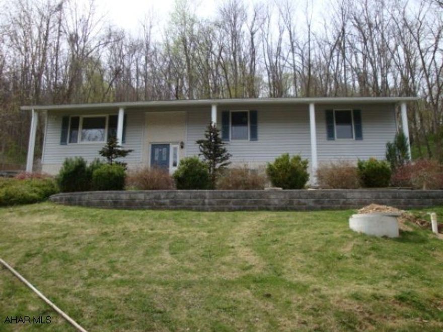 Property is being sold as is  Septic is holding tank. Foreclosure. Beautiful views of the golf course.  A little TLC would make this a great house! 4 BR, 2.75 BA, finished basement, oak kitchen.