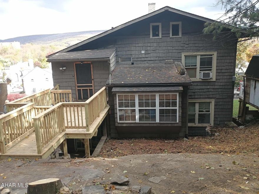 Spacious 2-Bedroom Apartment with Stunning City Views!  This beautiful, character-filled apartment offers an inviting blend of space, light, and charm.  Enter into the kitchen filled with lots of cabinets and counter space.  Next, make your way into the large dining.  The huge living room with decorative brick fireplace makes a great spot for entertaining.  Large windows and beautiful hardwood floors in the dining room and living room only add to the charm of this beautiful apartment. Doors from the dining room open directly to an outdoor terrace with a gorgeous city view while relaxing on the porch swing.  The 2 bedrooms are spacious.  The bathroom is clean and well-maintained.  Washer and dryer are included in the apartment.  Attic space available for extra storage.  Call today for more details!  This place is perfect for anyone who loves character, warmth, and plenty of room to relax and entertain. Call for details or to schedule a viewing!

***Fireplace is not to be used.  It is for looks only.  Heat, trash, water, and sewage are included.  Tenant is responsible for electricity.  First month and security deposit required prior to moving in.  Credit and background check required.  Pets are allowed but additional fee required.  Wi-fi and cable are not included and must be purchased separately by tenant.  ***Apartment is currently occupied and is not available until January 1, 2026.