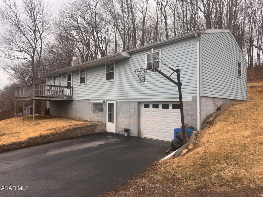 Portage:  4-5 BR  1 1/2 bath ranch home on 0.36-acre lot on dead end street.  Spacious eat-in kitchen.  Finished basement with bar and hard coal burner as additional heat source.  1 car Integral garage.