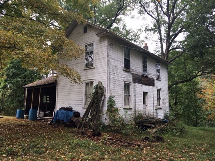 Very nice, secluded setting and on 10 acres. Adjacent to State Game lands. Quick access to Broad Top Rails to Trails and near Raystown Lake. Limited info as owner acquired through an estate. Frame 13'x13' shed. Barn 47'x20'. Needs much TLC.