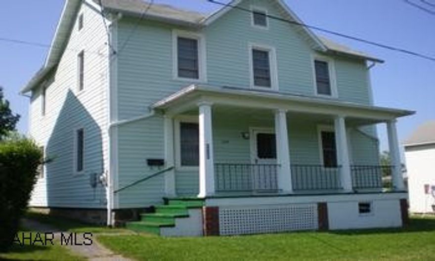 Remodeled 2 story w/detached 2 car garage.