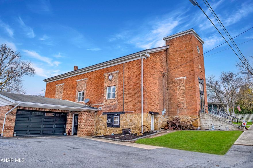 Stunning 1834 Church Conversion - 4 Bedroom, 3 Bath Home on a Spacious Lot

This beautifully remodeled 4-bedroom, 3-bath home seamlessly combines historic charm with modern living. With over 4,034 square feet of above-ground living space and a finished basement, it offers ample room for both relaxation and entertainment. A bonus room on the second floor provides the option for a fifth bedroom or flexible use to suit your lifestyle.

The home has been updated with a newer roof, replacement windows, and a modernized kitchen while preserving its original architectural features, which add character and charm. Set on a nearly 0.7-acre lot spanning three parcels, the property features a large yard perfect for outdoor activities.

A detached garage adds convenience, while the oil heat, supplemented by a pellet stove, ensures efficient and cost-effective heating. The home is serviced by well water and public sewer and includes a radon mitigation system for added peace of mind. With plenty of storage space and a spacious, open layout, this unique property offers an exceptional opportunity to own a one-of-a-kind home blending history and modern comfort.