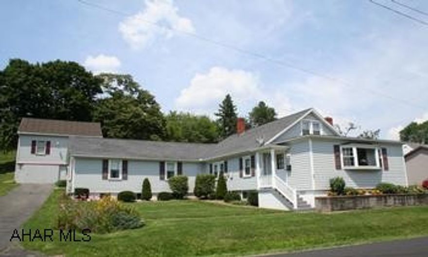 Delightful-super maintenance and thoroughly updated for maximum heating and cooling efficiency. Replaced all 42 windows, vinyl siding and porch railing, roof and spouting. Ceiling and walls blown in insulation. Size of property increased to 2.73 acres, barn and garage included.