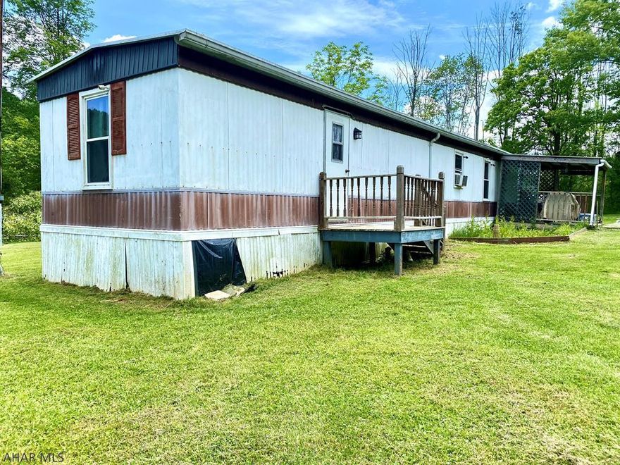 Located on a beautiful 1 acre lot, this is the perfect one-floor living house to make a home.  Enjoy the wooded views and tranquility provided in the pleasant surroundings.  This home offers 3 bedrooms and one bathroom with an open-concept living room & kitchen.  Schedule a showing today!