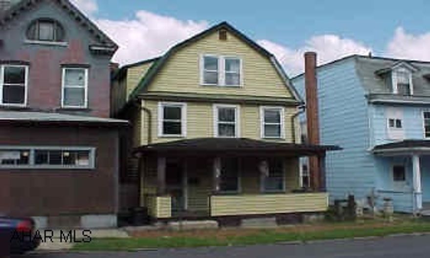 2 1/2 story house, was used as duplex but is vacant and needs complete renovation except for siding and some electrical work.