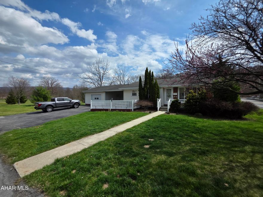 Located in a highly desirable area, this corner lot ranch offers convenient one-story living with a functional layout. The breezeway provides a versatile space to relax, unwind, or enjoy a morning coffee while staying protected from the elements, and connects directly to the one-car garage. The partially finished basement would be great for extra living space. The property also features a paved driveway and a manageable yard. Opportunity for buyers looking for low-maintenance one story living.