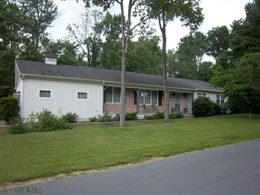 3 BR, 2.5 BA ranch with 2 car garage and work shop. Enclosed private rear patio with propane grill. All appliances stay. Taxes and room measurements to be verified by buyer.  Fireplace is either a wood burner or propane.  Family room is very spacious and rustic.  Barn wood walls accented by one stone wall with fireplace.