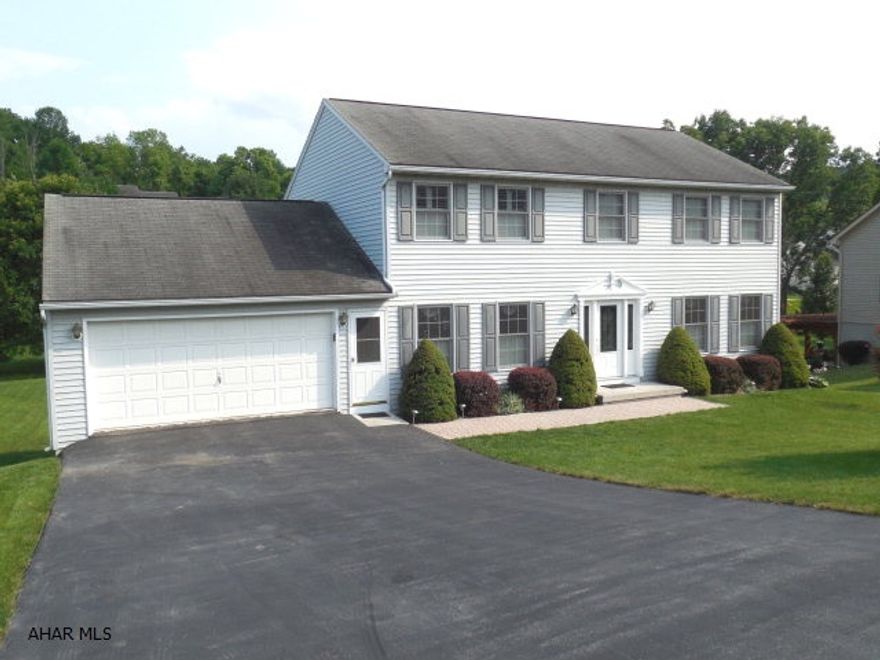 This 2 story Colonial home has 4 bed. and 3.5 baths on a spacious, private lot. Eat-in kitchen with ceramic floor and stainless steel appliances. A Solarshild sunroom  lets you experience the best of each season. Large covered deck 12x14 leads down to a concrete patio. lst floor family rm with gas fireplace plus additional daylight family rm in the lower level. 2 car garage plus additional garage under the house. This home has so many additional features. Don't Wait!!