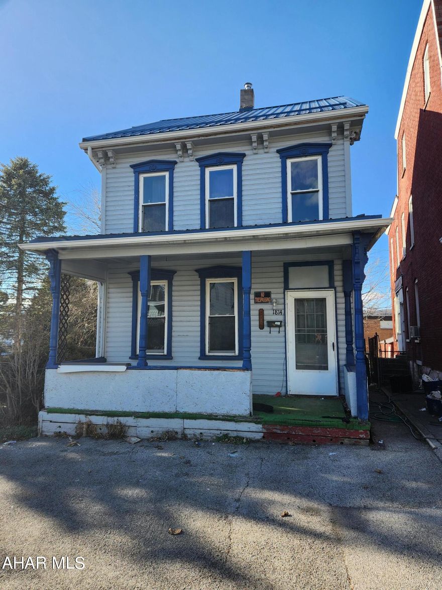 If you are looking for a home to fully remodel this is it. This home is being sold in AS-IS Condition.  The electric is on and active, gas and water are not currently on. A gas furnace can be installed to eliminate the current oil furnace. The backyard has a detached 2 car garage with a new roof. Cash purchase only.