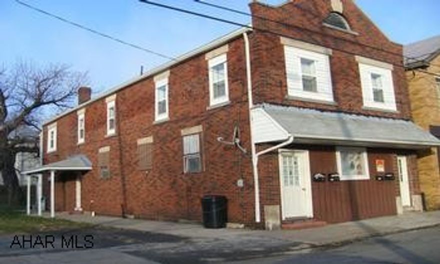 Two story brick Multi Unit Three units currently rented. Ample off street parking. Attention Investors well maintained 4 unit  building. Great Location. Many Possibilities. Excellent condition. Please call cathleen tubo to set up all showings at least a 24 hour notice.  2 units have 200 amp service 2 units have 100 amp service.