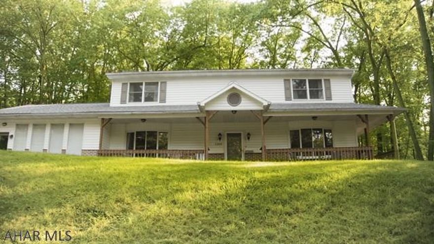 Under Contract w/Contingencies - A lovely 4 bedroom 4 bath home with rustic charm and modern design in a beautiful wooded setting. This property has it all! The cozy living room has the feel of a log cabin with stone and wood beam accents. A wood burning stove provides an added heat source in Winter months. Kitchen features cherry cabinets and opens out into the eat in kitchen area and living room. Upstairs - skylights and high ceilings illuminate the bedrooms and hallways with natural light.  Bathrooms are updated with modern fixtures. The Master Bedroom features skylights, a bathroom with double sinks and a large closet. Downstairs, you find a large recreation room with a wet bar and theater area. There is also a 2 car attached garage and a shed out back.