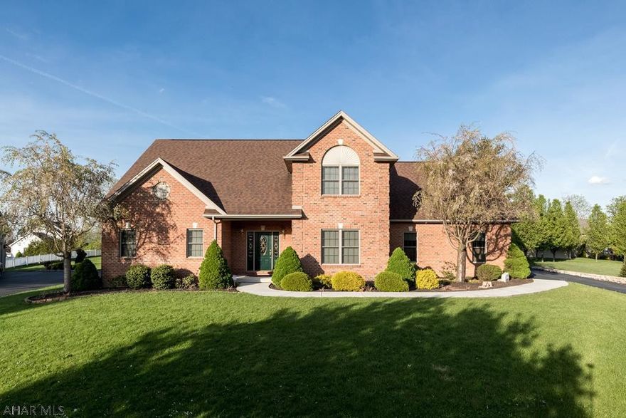 Gorgeous 2 story entrance showcases sampling of  Oak flooring,  Oak trim and  solid Oak doors throughout 1st floor. Den/office at entrance.  Hard wood floors extend into open floor plan of the great room, kitchen with eating are.  Double Hung oak doors off eating area open up to screen in porch area.  Kitchen appliances are S/S, convection oven, Bertch Legacy cabinets, skylights.  Formal Dn. Rm. off kitchen, 1st flr. Mstr. Bedroom with H/W flrs,. pocket door to Mstr Bath, W/I closet, 72" double bowl vanity, ceramic flrs, 2nd flr. has 3 bedrms., 2 full baths, additional storage room, balcony walk way.  Basement adds 1400 sq.ft. of finished rms. with Bonus rm. beamed ceilings, Huge family room with pocket door closets, 5th bedroom, full bath and Wet Bar entertainment area.  Metz Builder.