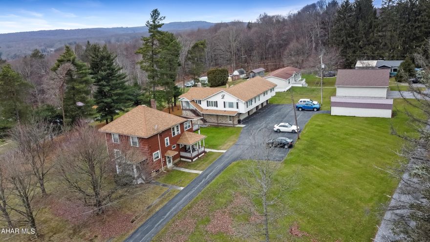 Welcome to 108 & 112 Pilot Street in the Central Cambria School Districts—an extraordinary property perfectly suited for a car collector, contractors, and those who appreciate a high-quality home with a spacious garage & an additional income-generating unit. Situated on approximately 1.24 acres, this property comprises a single-family home & a duplex. The main home boasts exceptional features, including a 6-bay heated garage, 4 bathrooms, 3 bedrooms, a bonus room, a generous eat-in kitchen, laundry facilities, a finished game room in the basement, & much more! The duplex is currently fully occupied & meticulously maintained. The lower unit presents 3 bedrooms, a full bath, a living area, and a kitchen, while the upper unit offers a kitchen, a living room, a bathroom, & 2 bedrooms. Laundry facilities are conveniently located in the basement for both units. This truly unique property provides endless possibilities. Don't hesitate—reach out to the listing agent today to explore this incredible opportunity!