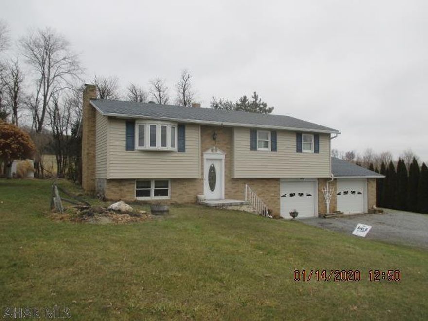 Beautiful country setting on large 1/2 acre lot with 2 car attached garage and large 24x32 detached garage/outbuilding in the back yard.