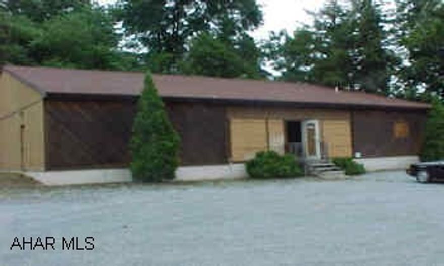 One story frame structure storefront - plenty of parking.  Was Jarret Music Store.
