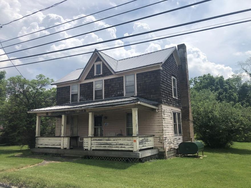 Cash or renovation loan financing only. Newer metal roof & newer furnace, Property is being sold in as-is condition, Nice level lot containing 0.69 acre. Public water & sewage- Lots of potential!