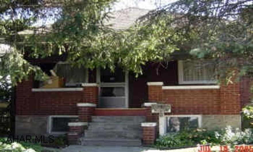 Brick 1 story convenient living, fenced yard, off street parking.