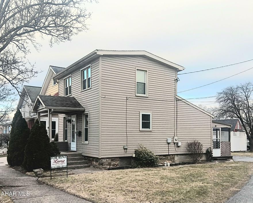 Take in this classic yet modern 1-bedroom, 1-bath home for rent in Hollidaysburg Borough, just minutes from historic downtown. This beautifully maintained residence blends timeless character with thoughtful modern updates at an exceptionally competitive price point. Inside, you'll find hardwood floors throughout, a remodeled full bathroom, and a bright, inviting layout. The screened-in porch offers the perfect space for relaxing or entertaining, while the large basement provides an impressive amount of storage. For added value and convenience, the landlord is now including water and trash in the rental price. An excellent opportunity to enjoy comfort, style, and location without compromise. Contact Lang Real Estate to obtain a rental application.