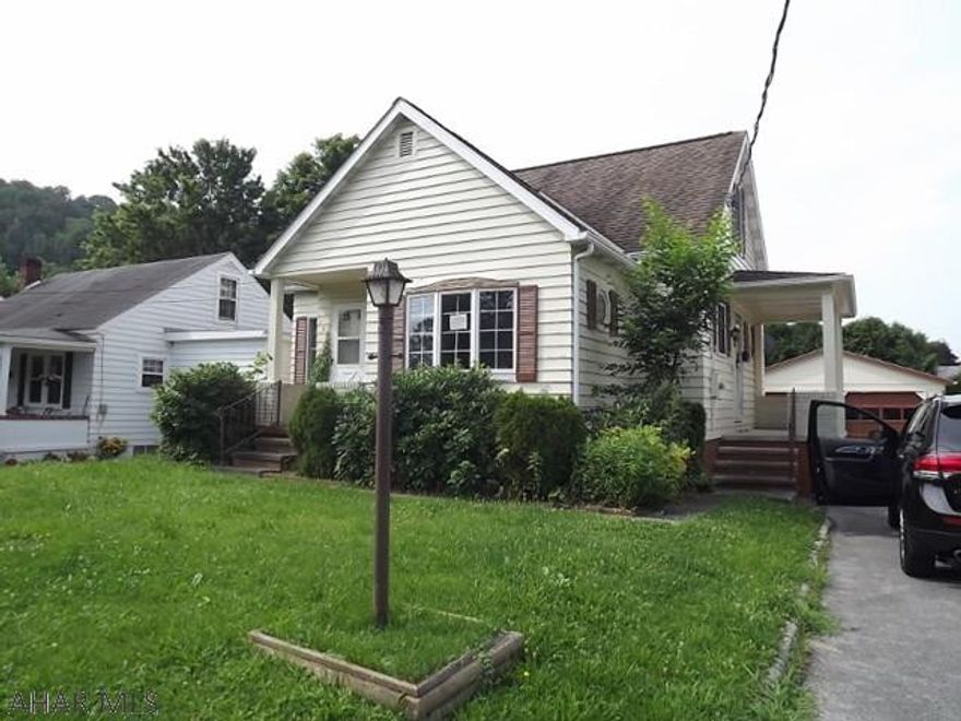 TLC needed to restore this 1940's bungalow to its original beauty! Close to town. Dead end street.