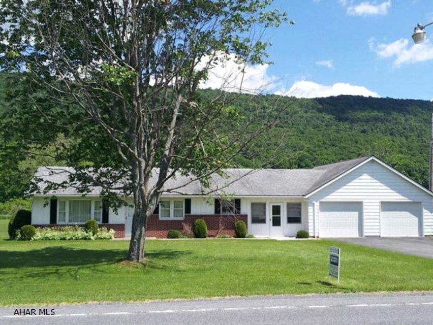 Nice energy efficient home on a lovely 1.5 acres located only 14 miles from Bedford.  Two bedrooms, 1 & 1.5 baths.  Large enclosed breezeway. Over sized garage.  Lots of storage.  Beautiful level lot with great mountain views.  Easy access to Bedford and Cumberland.