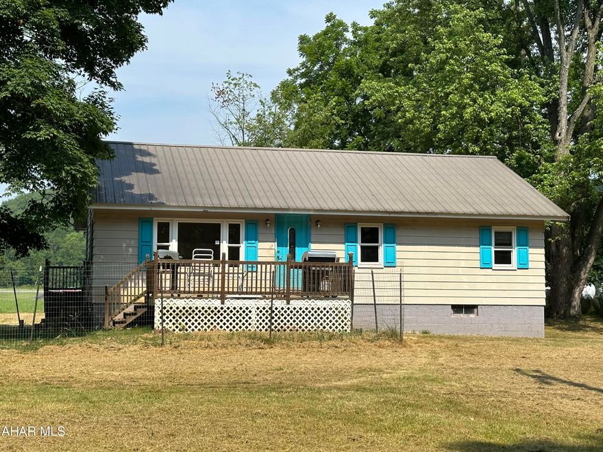 Enjoy your own half acre lot outside the city limits! This one story home offers an updated eat-in kitchen with new appliances, a bright living room, along with 3 bedrooms and 1 bathroom with a laundry area.