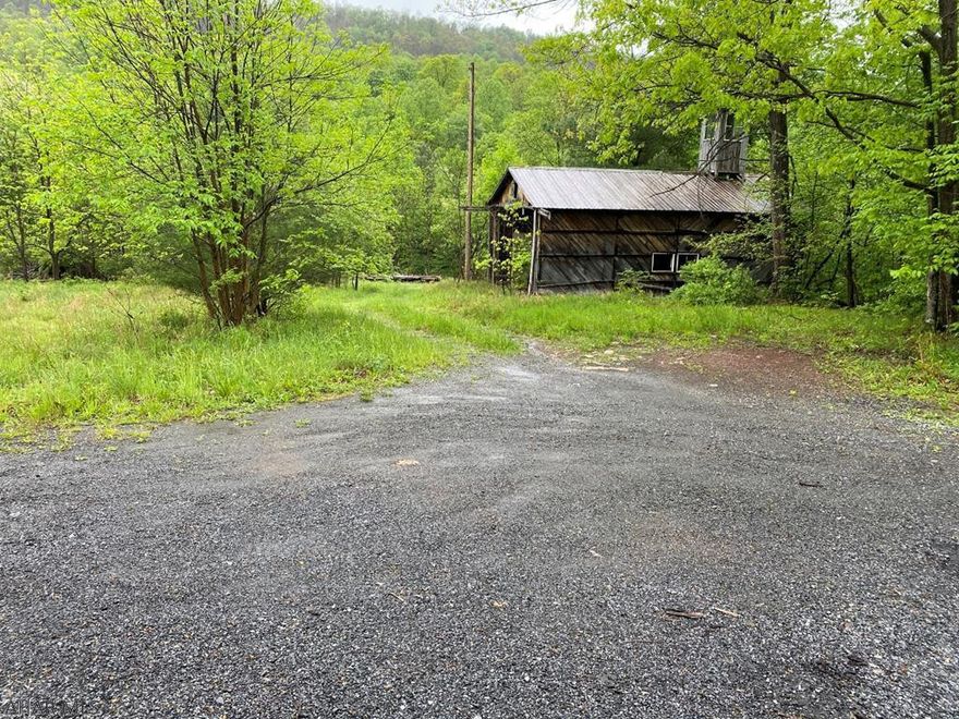 Nice flat lot in quiet area near State Game Lands and Buchanan State forest! Don't miss this affordable 14+ acres. Sherman Valley Run runs through part of property. Property has several entrances, one with gravel parking. Mainly flat cleared land with minimal wooded areas. Two outbuildings. Ready for your residence or hunting camp!