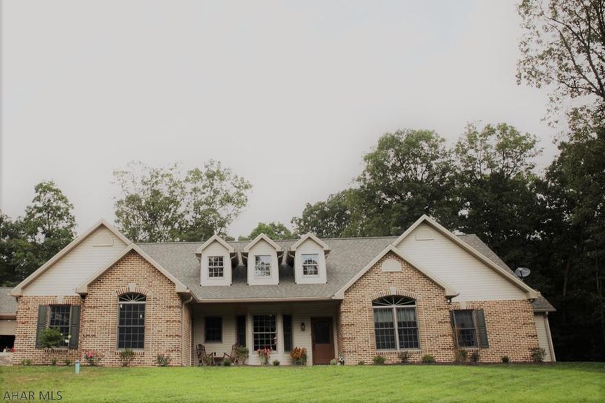 Stunning and secluded custom 4 bedroom, 3 bath main house on almost 17 wooded acres with an additional 1 (possible 2) bedroom, 1 bath cottage w/ 960 sq ft. Open floor plans w/ main house offering a split floor plan w/ 2 master suites. Top of the line materials and energy-efficient! Convenient location between Bedford & Johnstown.