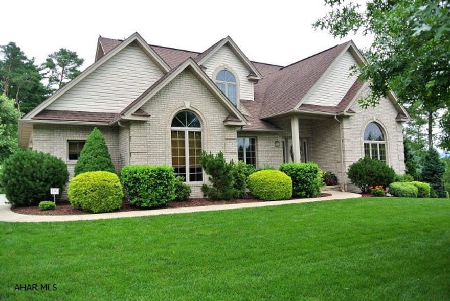 WOW!! That's exactly what i said.... when i walked into this absolutely 'Stunning' 4 bedroom custom built home!  From the floors to the ceilings this home is just magnificent in character, quality, and charm.  Even as you pull in front of the home, its fantastic curb appeal with circle top windows and tremendous roof lines are just dazzling.  This home features a very spacious first floor Master suite, a 2 story Great Room,and a beautiful kitchen with Stainless steel appliances. 3 additional 2nd flr bedrooms, and a Huge Recreation room in the finished lower level. Also, a Sunroom that opens to a composite deck. and a very private rear yard surrounded by the very lovely and enchanting landscaping where you can listen to the soothing sounds of water by way of a beautifully created pond. WOW!