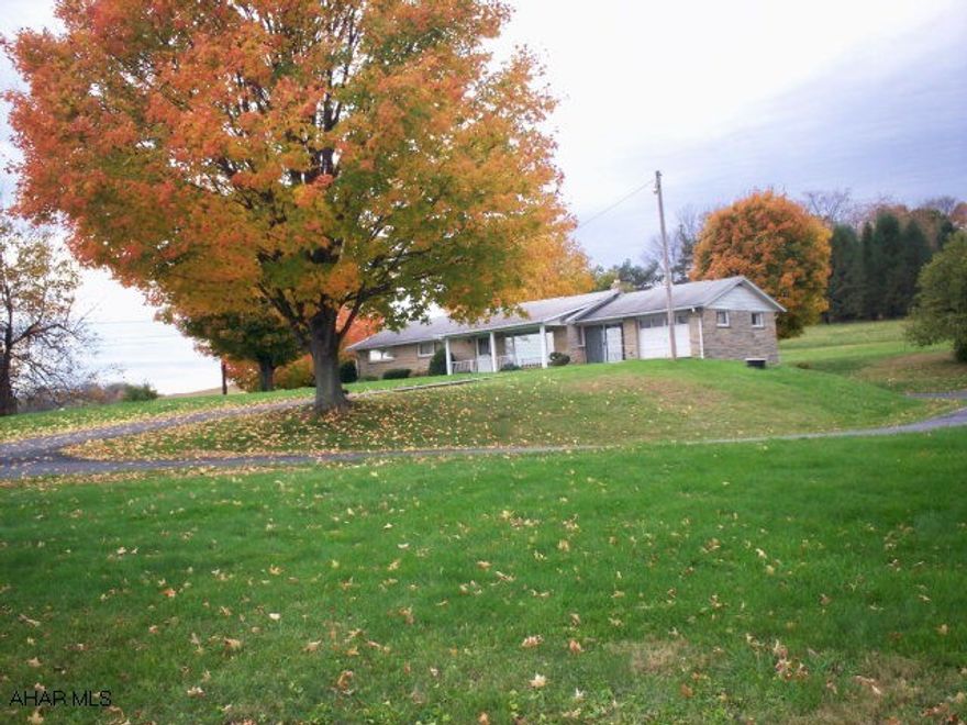 Solid, well-built Stone Rancher on 1.4 acres located in the Cessna area. 3 bedrooms and 2 baths. Gorgeous country-like setting. Finished family room in basement (including a coal stove).  Easy access to Rt 99, Rt 56 and Rt 220. Only minutes from Bedford as well as the Chestnut Ridge area.
