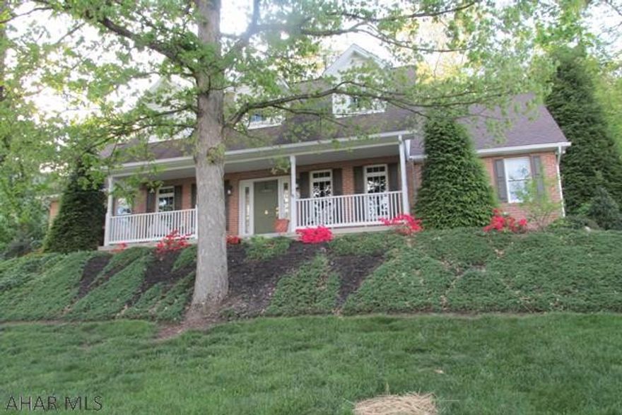 Spacious Cape Cod - spectacular view, private lot. Large first floor Master Suite, large open living room with vaulted ceiling, formal dining room, large eat-in kitchen with granite counters, updated stainless steel appliances and new washer and dryer. large bedrooms, lots of closet space, family/rec room in basement, 32 feet of shelving for storage. Covered front porch 32 x 7, open patio. Neutral colors, move right in!!! Sellers are both licensed real estate agents. Leased water treatment system. Landscape lighting. Garage is 21'7" X 21'3"