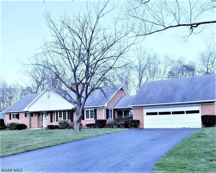 Well built, one owner brick home. 4 bedrooms and 4 baths. Family room off the kitchen offers an inviting brick wood fireplace. Screened breezeway leads to attached oversized 2 car garage. Full unfinished basement with a wood fireplace. Bay window in the living room to enjoy the beautiful view. Newer heat pump and central air. Spacious yard and paved driveway,