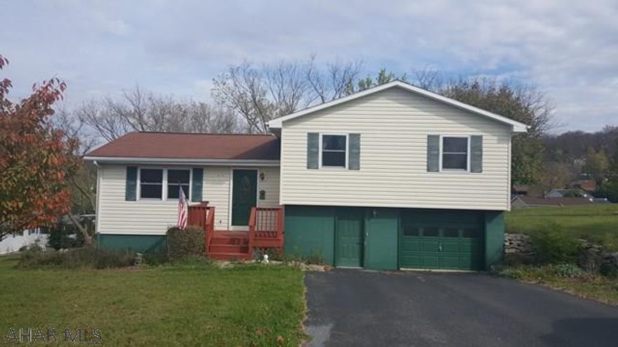 Lovely home in the Hollidaysburg Area School District- Frankstown Elementary! Situated on a corner lot in Rolling Hills, this home features Brazilian Cherry floors, a cozy kitchen complete with ALL appliances and a living room which features a Harmon pellet stove that will go to great use during those cold winter nights. The first floor is complete with a sunroom, that would make a great first-floor family room or bonus/office space. The semi-open floor plan will make entertaining a breeze for the new owners! The basement features a mud room, laundry room with 3/4 bath, as well as an additional bonus room that's use is only limited by your imagination. The exterior features vinyl siding, and a deck with an incredible year-round view for miles and miles. Call Listing Agent today for showing