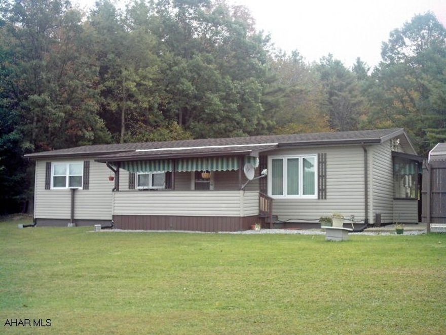 This lovely 2 acre lot is secluded and peaceful with a modular home that is extremely energy efficient--propane insta heat HWH, triple pane windows, and a high efficiency furnace--perfect location for getting away from it all--Priced To Sell!!