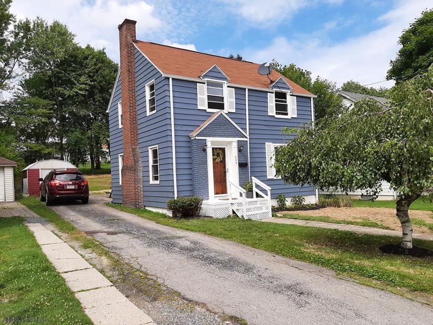 This charming home is in move-in condition. New shingles were put on in 2012. A new water heater was installed in 2015. Other features:  updated kitchen and bathrooms, hardwood floors, newer windows, charming front door, new stainless steel Frigidaire appliances, original interior doors & knobs, multiple ceiling fans, a wood-burning fireplace, and new carpeting. You'll love it.