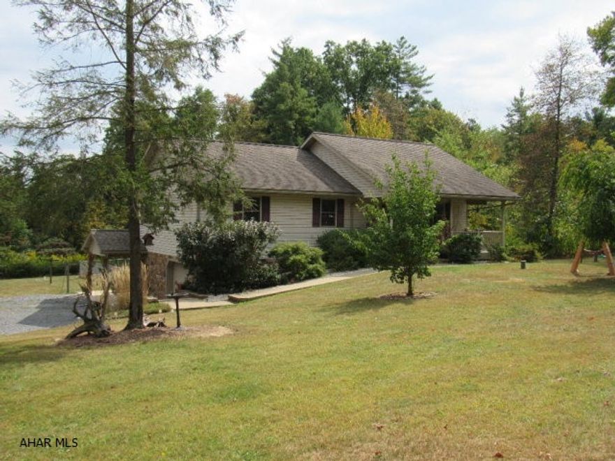 Well built,meticulously maintained Vinyl&Stone 3BR, 2.5BA Ranch home w/its Superior Walls,Andersen Windows,& Geo-Thermal heating/AC system is on 3.08 acres,located in Todd,PA & within 15 min. to Lake Raystown Resort & 18 min. to Trough Creek State Park.A newly upgraded kitchen with island & Eat-In Kit area,cathedral white pine tongue & groove ceiling in Living Room and Kitchen, & Laundry on 1st Flr. The lower level has a Hair Salon but could easily be converted to a family room.There is plenty of storage in the lower level with an additional 15'6x 14'6 room & another 15'6' x 12' room that could be converted to a 4th bedroom.This property also has a 8x22 covered front porch,fenced in yard,a 12x20 Shed,16x20 Garage, & a 3 tier partial composite deck.Once you see this home, Start Packing!