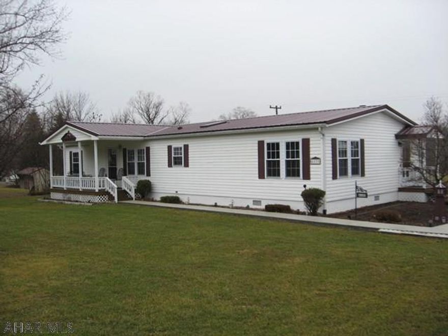 Come take a look at this immaculately kept doublewide home on a level .756 acre lot.  This expansive home has lots of room to enjoy friends or family gatherings inside and outside.  Plus:  a newer roof, upgraded windows, central air, two car garage, shed and carport.  You don't find them this clean and well kept.