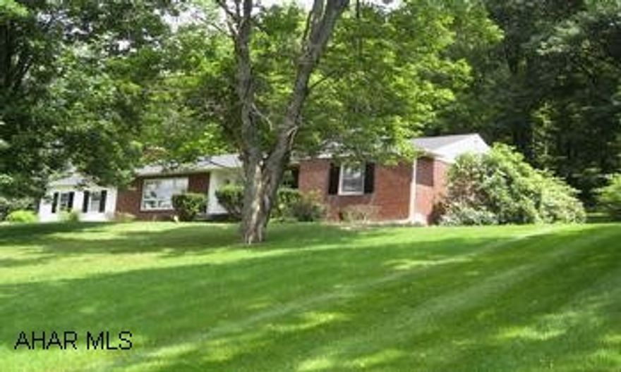 Brick ranch in very desirable neighborhood. "Price Reduced-Motivated Seller" $5,000 decorating allowance with accepted offer. Brick ranch located in Meadowbrook Terrace development, overlooking Bedford.  New roof in June of 2009 and newly painted interior. Large lot is partially wooded and affords great view.