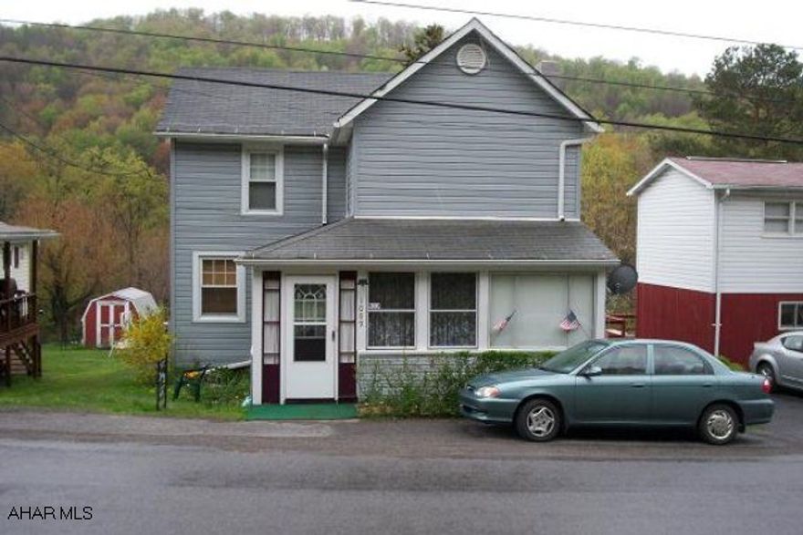 2 story, 2 bedroom vinyl sided home in Elmora. This home has some new replacement windows.