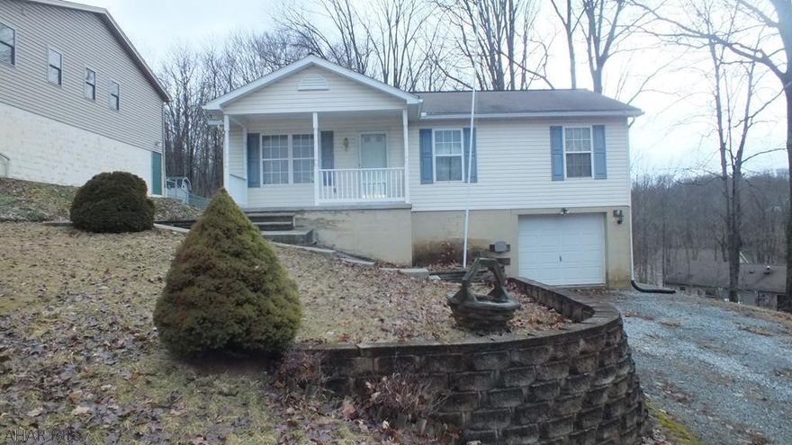 Juniata vinyl 1 story constructed in approx.1999, so modern floor plan with eat-in kitchen, 3 bedrooms, 1.5 baths, 1 car integral garage and large rear deck. Needs some work, but great location on dead-end street. AS-IS sale. Seller will make no repairs.