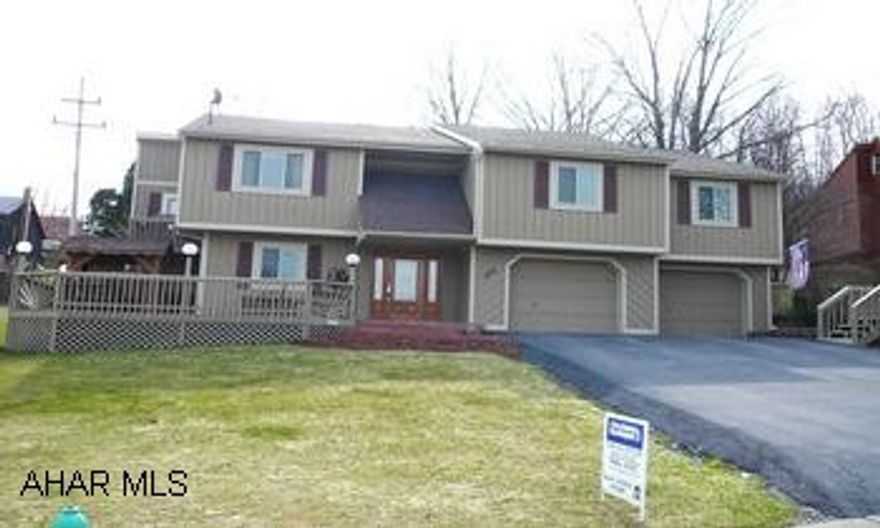 LOT SIZE IS 100.95/77.28X133.72/121.86. 2 FURNACES, 2 A/C UNITS. OVERSIZED 2 CAR GARAGE. YOU CAN PARK 3 CARS AND STILL HAVE STORAGE. OPEN FLOOR PLAN. SLIDING DOORS OUT OF MASTER BEDROOM TO DECK. SEVERAL DECKS WITH VIEWS. UNIQUE CEDAR HOME. ONE OF A KIND. PRIVATE BACK YARD. MULTI LEVEL DECKS.ROOM FOR EXPANSION ON GROUND LEVEL UNDER 4 SEASON ROOM.