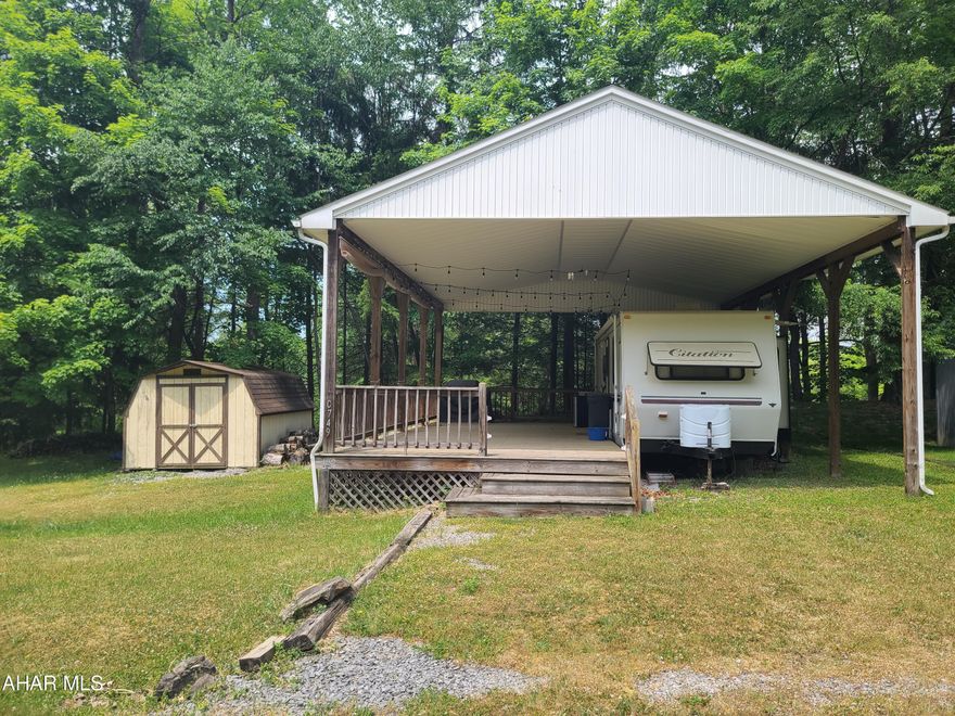 1998 Citation camper on 1 lot inside Glendale Yearound.  Camper is under a large pavilion with a large deck attached. Located on a corner lot not far from the pool. Small shed also on the property. Glendale Yearound is a gated community located minutes from Glendale Lake and Prince Gallitzin State Park